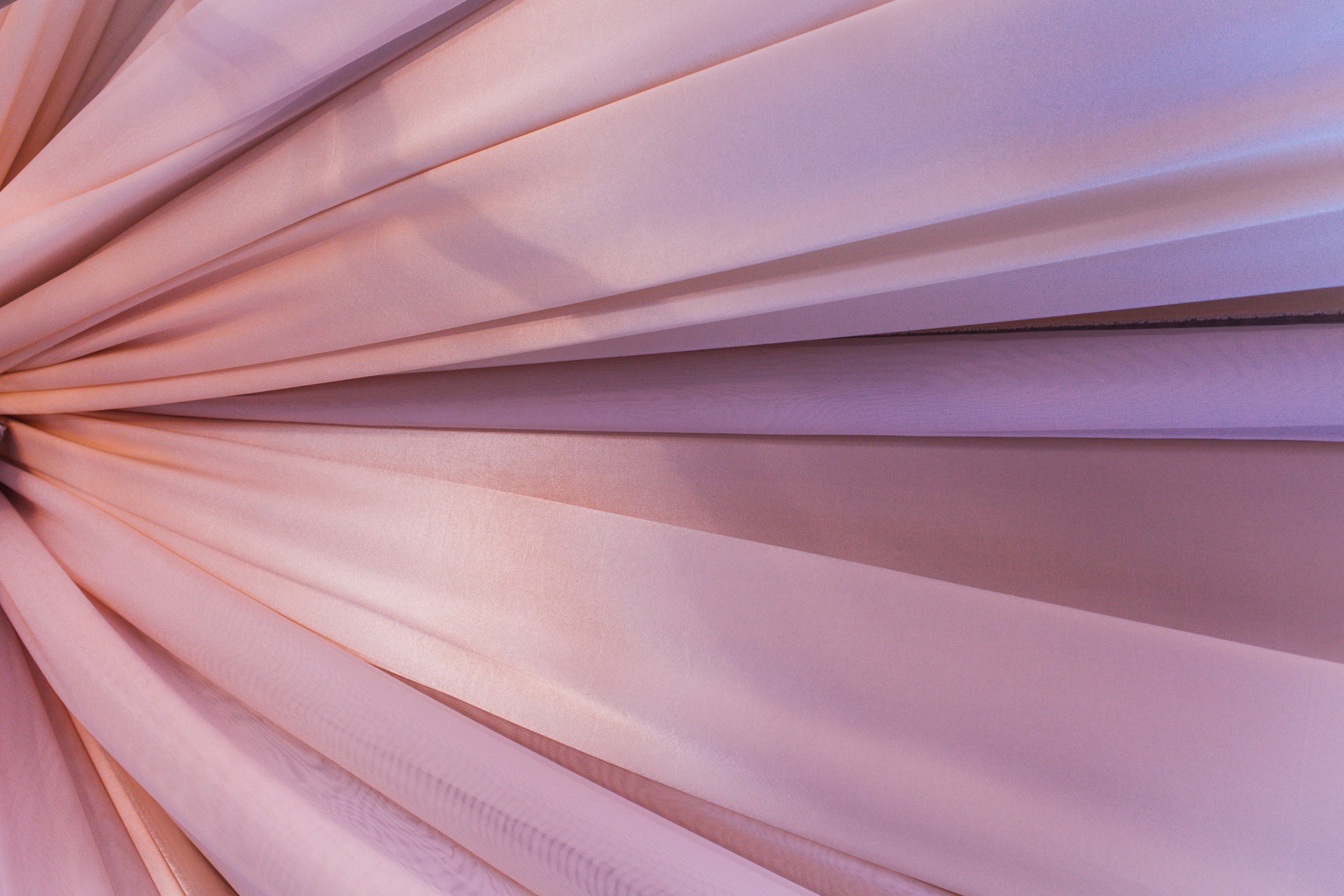 Folds of powder pink silk