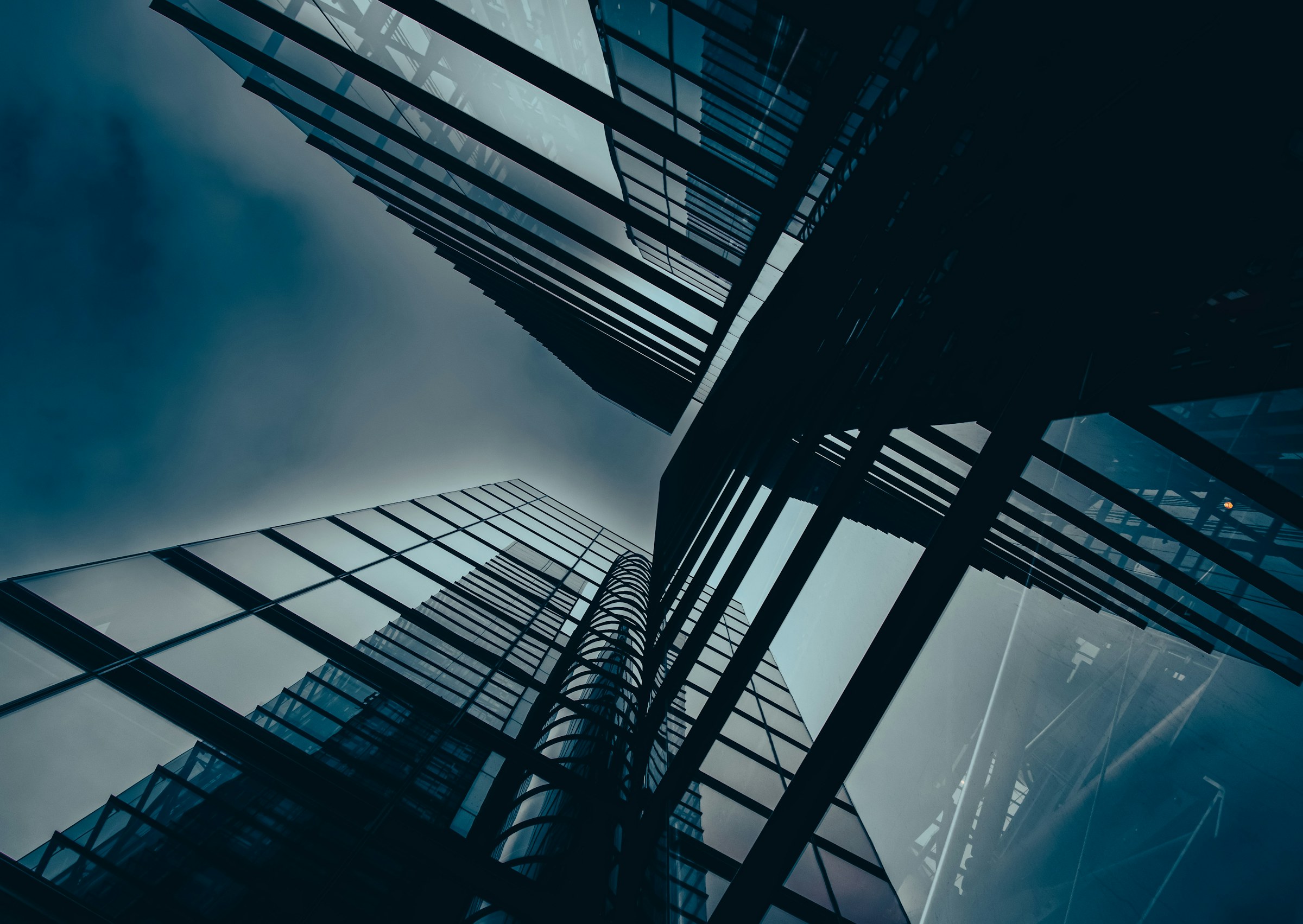 Glass office towers seen from below
